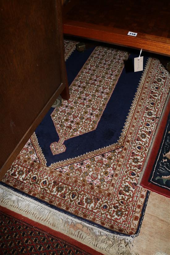 An Indian silk rug, 5ft 1in x 3ft.